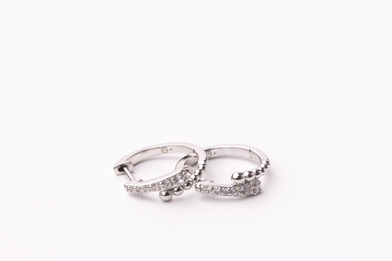 The "Dots of Love Earrings" on a white background.